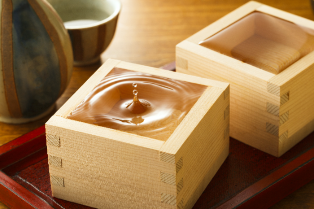 Sake poured into a small wooden box