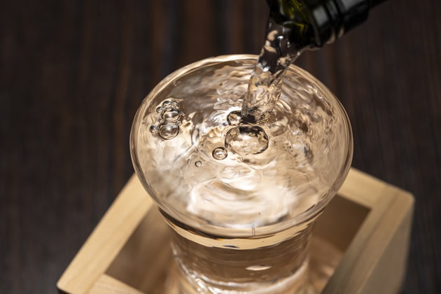 SAKE poured into a cup