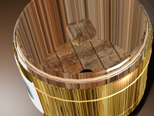 甑の底にサルを設置する様子